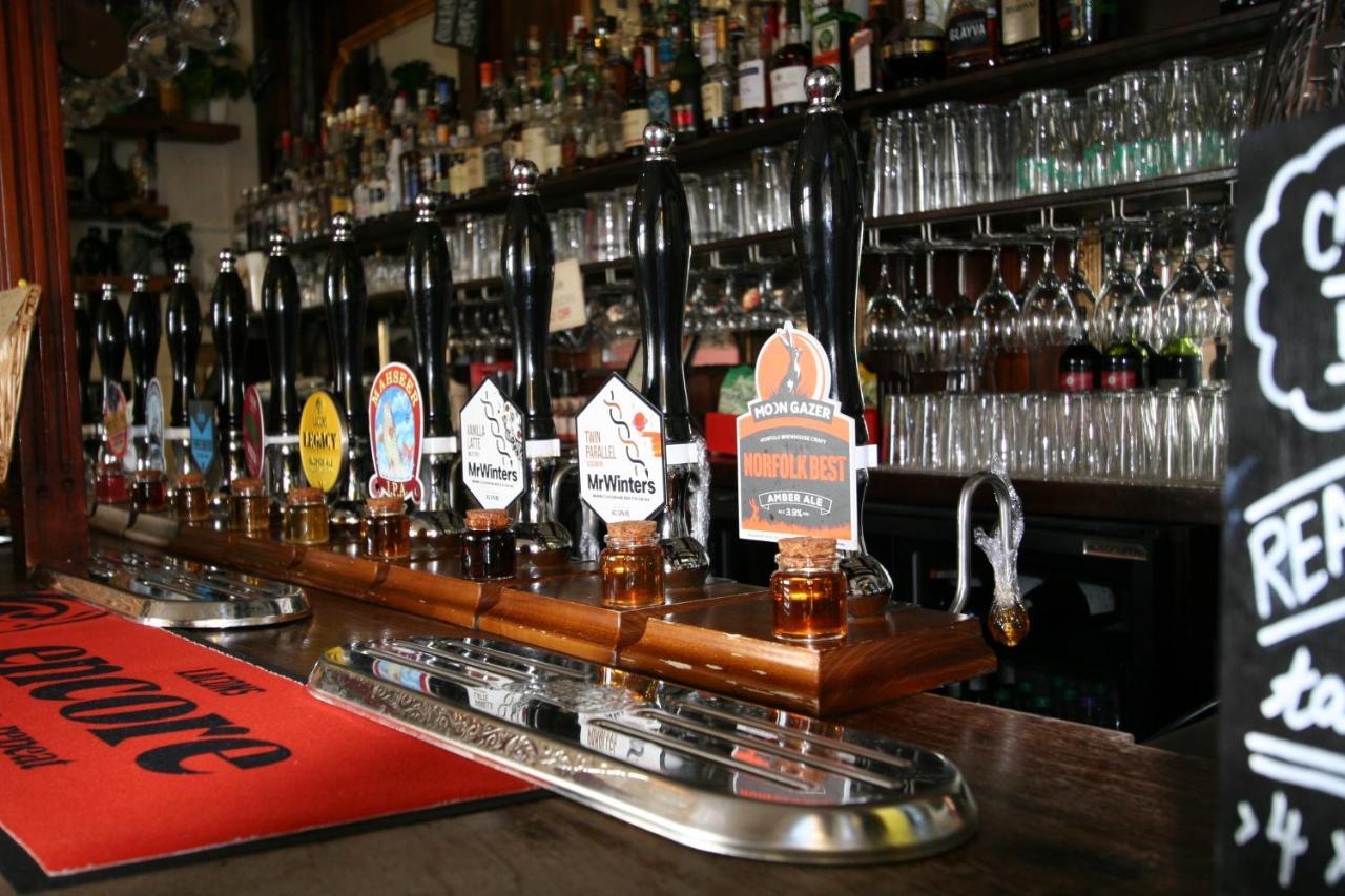 The Red Lion Hotel Кромър Екстериор снимка Beer taps in a pub