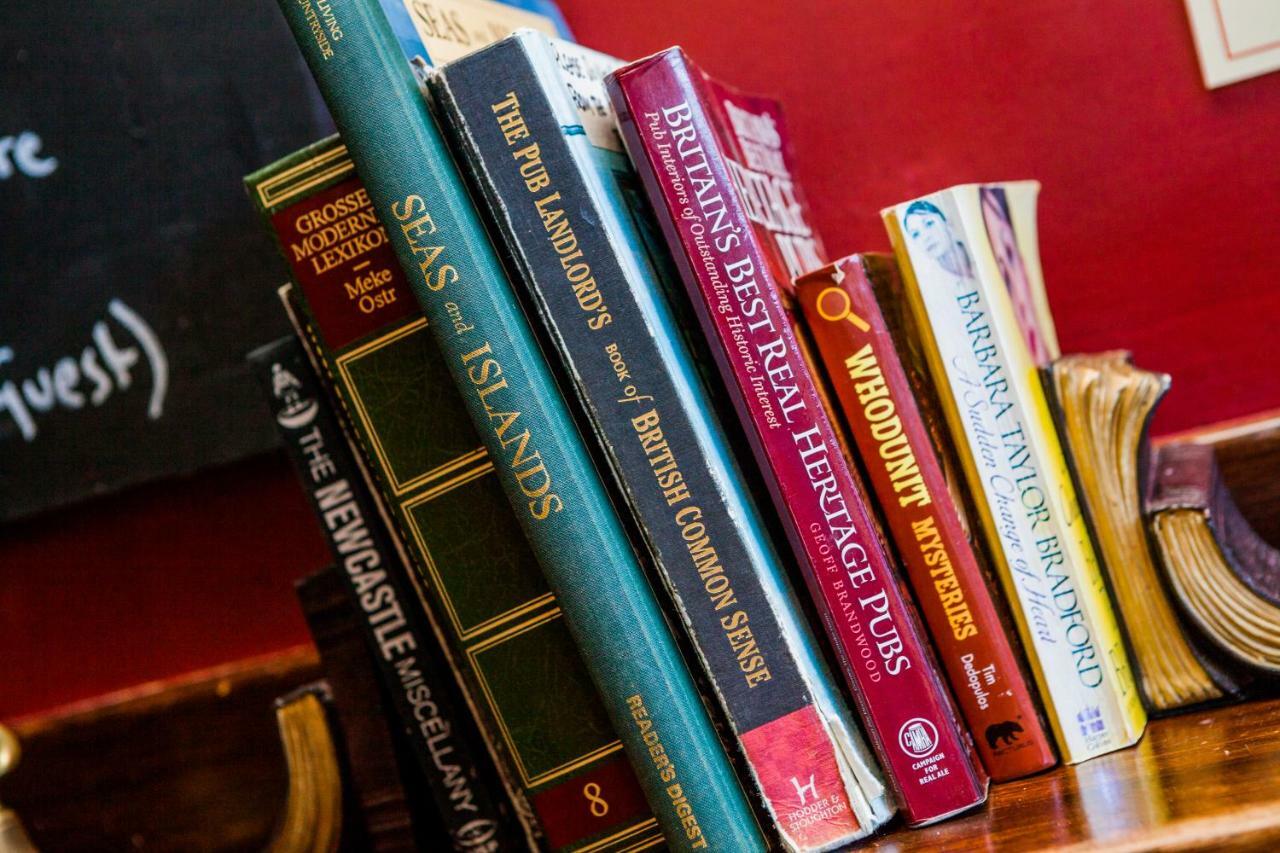 The Red Lion Hotel Кромър Екстериор снимка Books on the shelf at the New World Encyclopedia Store